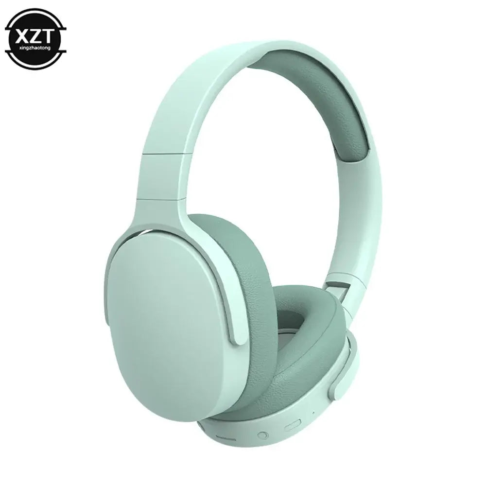 Wireless Bluetooth headphones in mint green, featuring padded earcups and control buttons for optimal comfort and sound quality.