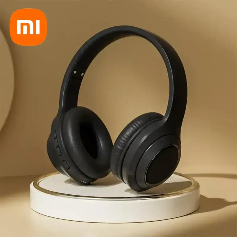 Xiaomi TH30 foldable wireless earphones on display, showcasing sleek design and comfortable memory foam ear pads.