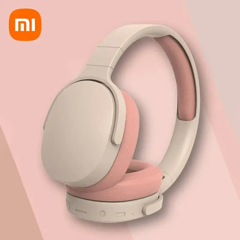 Xiaomi wireless headphones in beige and pink, featuring comfortable ear cushions and sleek design for enhanced audio experience.