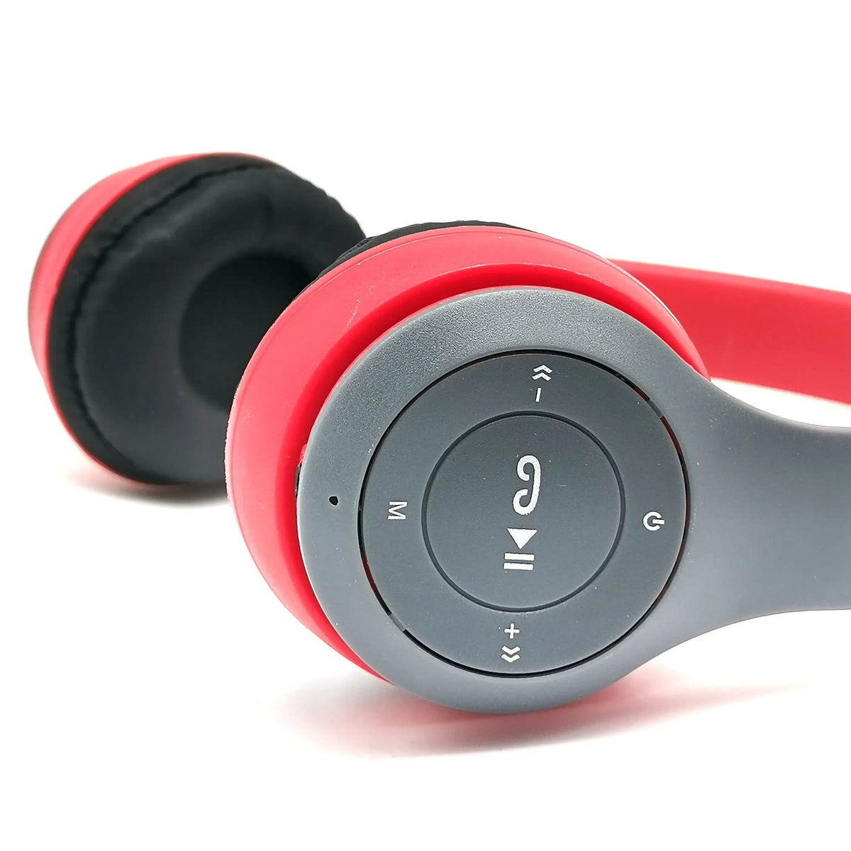 Close-up of Bluetooth 5.0 wireless headphones with control buttons in red and gray design. Ideal for kids and music lovers.