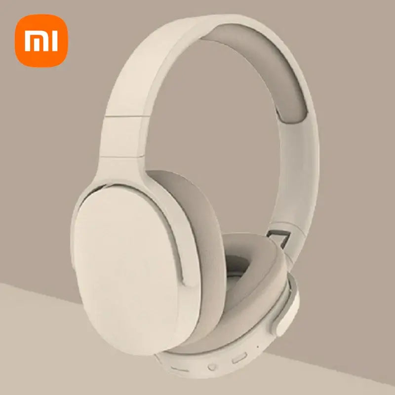 Xiaomi wireless headphones in beige, featuring a sleek design and comfortable ear cushions for optimal sound experience.