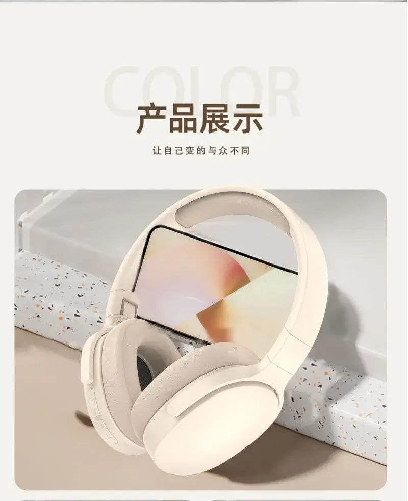 Original Xiaomi Wireless Headphones displayed beside a smartphone on a stylish surface in soft cream color.